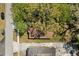An aerial top down view showing a home with a mature tree coverage and surrounding streets at 226 N Frederick Ave, Daytona Beach, FL 32114