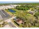 Aerial view highlighting the house and proximity to a scenic pond and commercial area at 226 N Frederick Ave, Daytona Beach, FL 32114