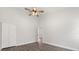 Bright bedroom has a ceiling fan, wood-look flooring and high ceilings at 226 N Frederick Ave, Daytona Beach, FL 32114