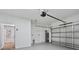 Spacious two car garage with epoxy flooring and new garage door at 226 N Frederick Ave, Daytona Beach, FL 32114