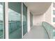 Spacious balcony overlooking the Halifax River with sliding glass doors at 231 Riverside Dr # 1003-1, Daytona Beach, FL 32117