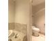 Modern bathroom featuring a separate toilet room and bathtub at 231 Riverside Dr # 1003-1, Daytona Beach, FL 32117