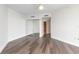 Bedroom with wood flooring, closet with mirrored doors, and ceiling fan at 231 Riverside Dr # 1003-1, Daytona Beach, FL 32117