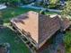 Aerial view showcasing the home's roof, landscaping, and proximity to the surrounding neighborhood at 232 Westchester Dr, Deland, FL 32724