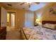 Comfortable bedroom featuring neutral walls, white closets, and an ensuite bathroom at 232 Westchester Dr, Deland, FL 32724