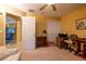 Additional bedroom with ample closet space, a work space, and neutral carpet at 232 Westchester Dr, Deland, FL 32724