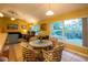 Bright living room with high ceilings and a view of the backyard at 232 Westchester Dr, Deland, FL 32724