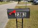 Street view of the mailbox displaying the house number, complementing the curb appeal of the property at 2383 Dumas Dr, Deltona, FL 32738