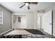 Well-lit bedroom with a closet, modern decor, and a serene ambiance at 2415 India Palm Dr, Edgewater, FL 32141