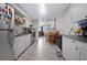 This galley kitchen features stainless steel appliances and an eat-in kitchen set at 2415 India Palm Dr, Edgewater, FL 32141