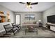 Cozy living room with stylish furniture, neutral tones, and a comfortable atmosphere at 2415 India Palm Dr, Edgewater, FL 32141