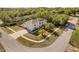 Aerial view of home showcasing a driveway and mature landscaping at 2479 Vaughn Ave, Deltona, FL 32725