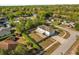Aerial view of the property showcasing mature trees and neighborhood at 2479 Vaughn Ave, Deltona, FL 32725