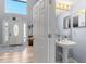 Entrance hall featuring a view of the bathroom and the main door at 2479 Vaughn Ave, Deltona, FL 32725