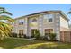 Two-story home featuring a well-manicured lawn and decorative landscaping at 2479 Vaughn Ave, Deltona, FL 32725
