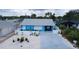 Charming blue single-story home featuring a white fence and a well-manicured front yard at 28 River Dr, Ormond Beach, FL 32176