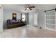Comfortable living room featuring tile floors, modern furniture, and abundant natural light at 28 River Dr, Ormond Beach, FL 32176