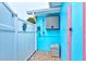 An outdoor shower provides a private space to rinse off after a trip to the beach at 28 River Dr, Ormond Beach, FL 32176
