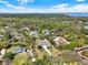 Aerial view showcasing a home in a lush, green neighborhood at 29127 Old E Ml, Tavares, FL 32778