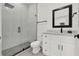 This bathroom features a large walk-in shower, sleek fixtures, and modern vanity at 29127 Old E Ml, Tavares, FL 32778