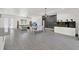 Open living and dining area with tile floors and an aquarium at 29127 Old E Ml, Tavares, FL 32778