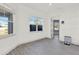 Bright living room featuring wood floors, neutral walls, and large windows at 29127 Old E Ml, Tavares, FL 32778