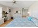 This bedroom boasts a ceiling fan, neutral walls, and stylish furniture for a cozy and inviting space at 2967 S Atlantic Ave # 301, Daytona Beach Shores, FL 32118