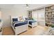 Bright bedroom with built-in shelving and storage, perfect for a room at 2967 S Atlantic Ave # 301, Daytona Beach Shores, FL 32118