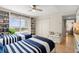Sun-filled bedroom with custom built-ins offers storage and style at 2967 S Atlantic Ave # 301, Daytona Beach Shores, FL 32118
