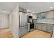 Functional kitchen with stainless steel appliances, plenty of cabinet space, and stylish finishes at 2967 S Atlantic Ave # 301, Daytona Beach Shores, FL 32118