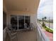 Balcony with seating offers outdoor space to enjoy the sunshine and city views at 2967 S Atlantic Ave # 301, Daytona Beach Shores, FL 32118
