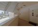Exterior hallway leads to unit with door adorned with patriotic decor at 2967 S Atlantic Ave # 301, Daytona Beach Shores, FL 32118