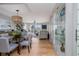 Open-concept living area with dining and comfortable seating at 2967 S Atlantic Ave # 301, Daytona Beach Shores, FL 32118