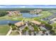 Aerial view of Venetian Bay, featuring a golf course, lakes, clubhouse, and residential neighborhoods at 3075 Meleto Blvd, New Smyrna Beach, FL 32168