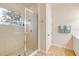 Modern bathroom with glass shower and towel rack at 3145 Connemara Dr, Ormond Beach, FL 32174