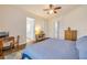 Spacious bedroom with wood floors and an ensuite bathroom at 3145 Connemara Dr, Ormond Beach, FL 32174