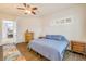 Cozy bedroom featuring hardwood floors, modern ceiling fan and private entrance at 3145 Connemara Dr, Ormond Beach, FL 32174