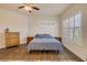 Bedroom features hard wood floors, shutters, ceiling fan and neutral walls at 3145 Connemara Dr, Ormond Beach, FL 32174