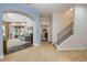 Foyer features staircase, archways, and tile flooring at 3145 Connemara Dr, Ormond Beach, FL 32174