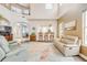 Bright living room with soaring ceilings, clerestory windows, comfortable seating, and arched entryways at 3145 Connemara Dr, Ormond Beach, FL 32174