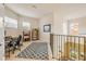 Bright loft space featuring a desk area and views of the community at 3145 Connemara Dr, Ormond Beach, FL 32174