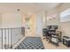 Upstairs loft area with desk, carpet, and plenty of natural light at 3145 Connemara Dr, Ormond Beach, FL 32174