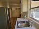 Kitchen featuring stainless steel appliances, sink, and ample countertop space at 318 S Massachusetts Ave, Deland, FL 32724