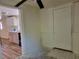 Room with door leading into kitchen at 318 S Massachusetts Ave, Deland, FL 32724