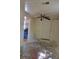 Room with ceiling fan and a glimpse of the kitchen at 318 S Massachusetts Ave, Deland, FL 32724