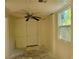 Room with a ceiling fan and exterior door at 318 S Massachusetts Ave, Deland, FL 32724