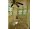 Room with windows and ceiling fan at 318 S Massachusetts Ave, Deland, FL 32724