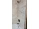 Shower with square shower head and newly tiled walls at 318 S Massachusetts Ave, Deland, FL 32724