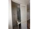 Small utility closet showcasing the AC unit and ductwork at 318 S Massachusetts Ave, Deland, FL 32724
