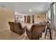 Open-concept living room featuring tile flooring and comfortable seating at 321 Wade Ave, Deland, FL 32724